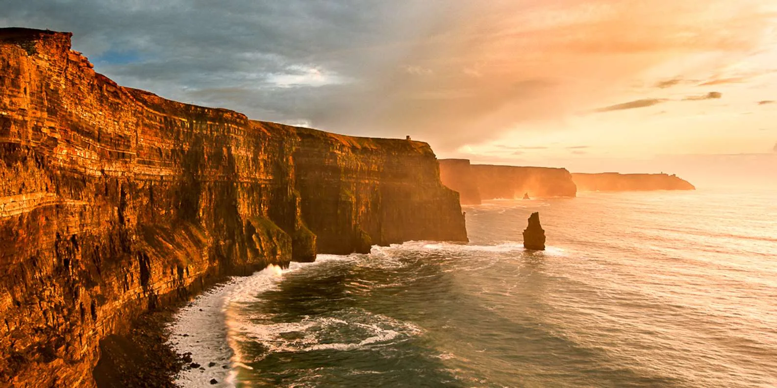 Scenic cliff walk along the Cliffs of Moher with breathtaking Atlantic views